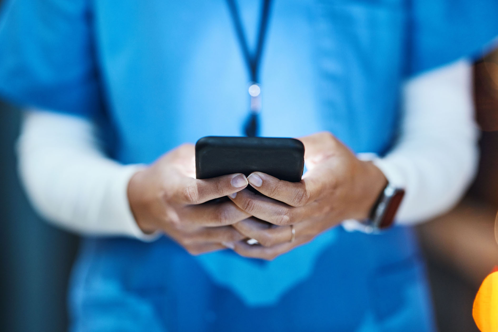 nurse holding phone