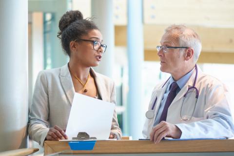 Image of a doctor talking to someone