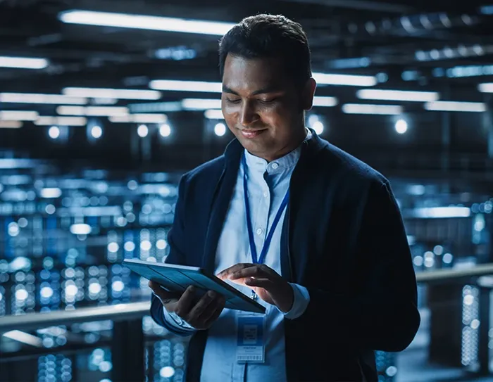 IT person looking at a tablet