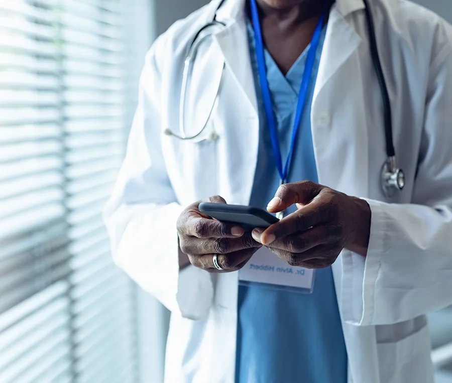 Doctor using a mobile devices